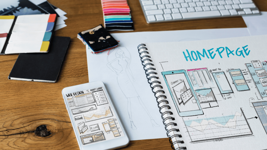 Web design KL: workspace with homepage sketches and design tools.