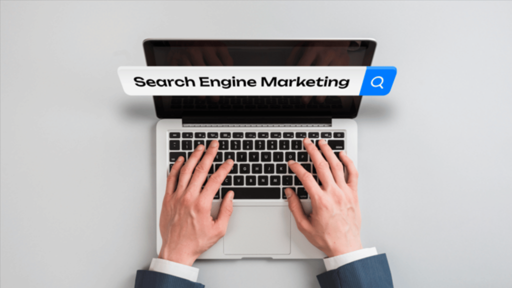 person typing on a laptop with a search bar displaying 'Search Engine Marketing'